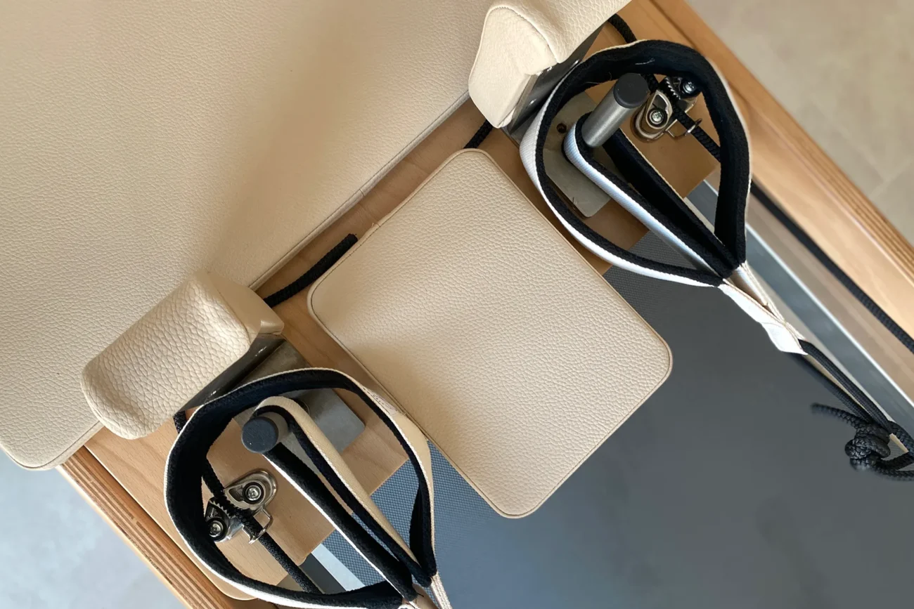 Close-up view of a professional reformer Pilates machine at Friday Pilates studio in Budapest